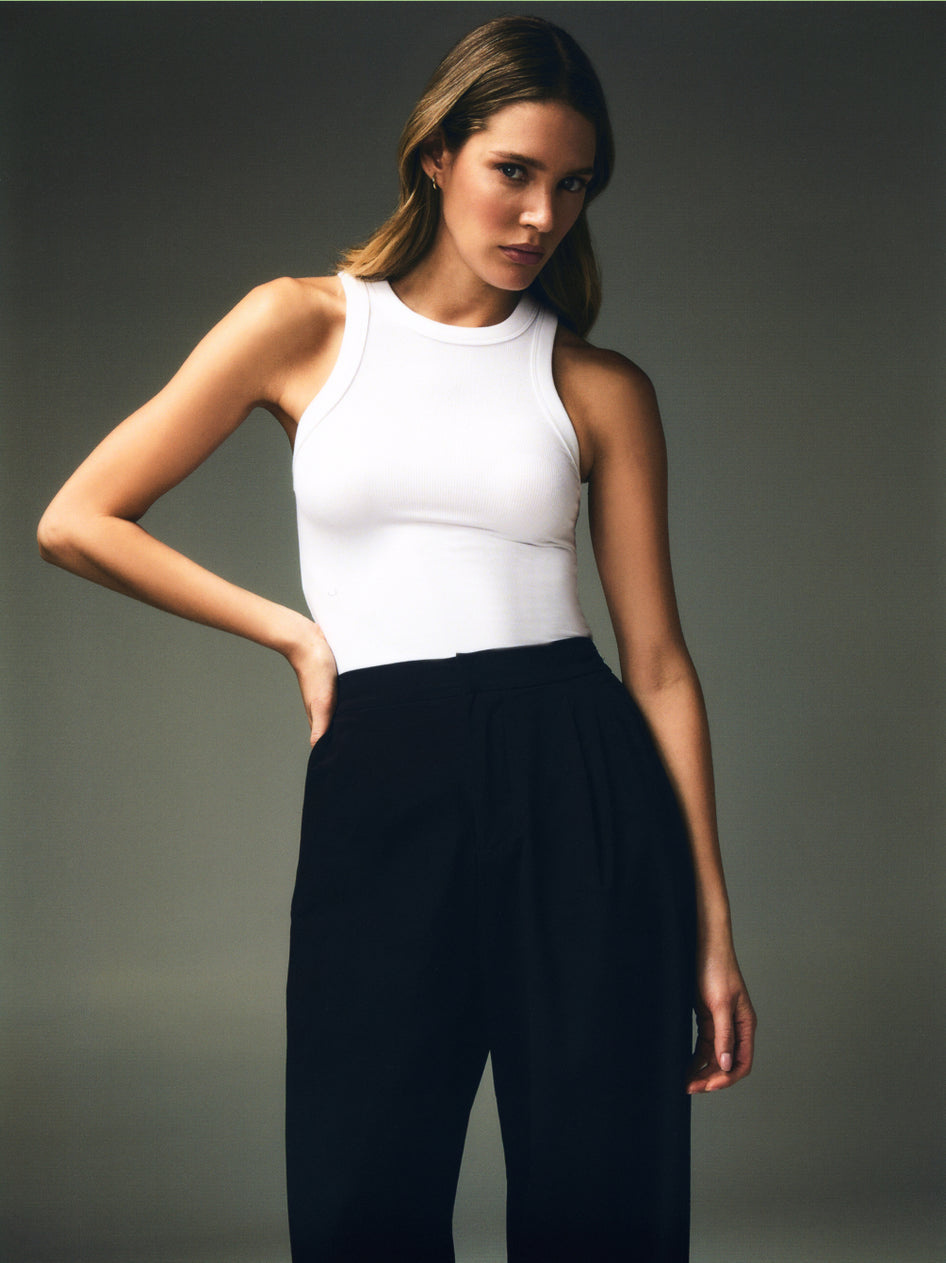 White Ribbed Racerback Tank & Black High-Rise Trouser Women's Essentials Look - Cropped On Model | Greyson Clothiers