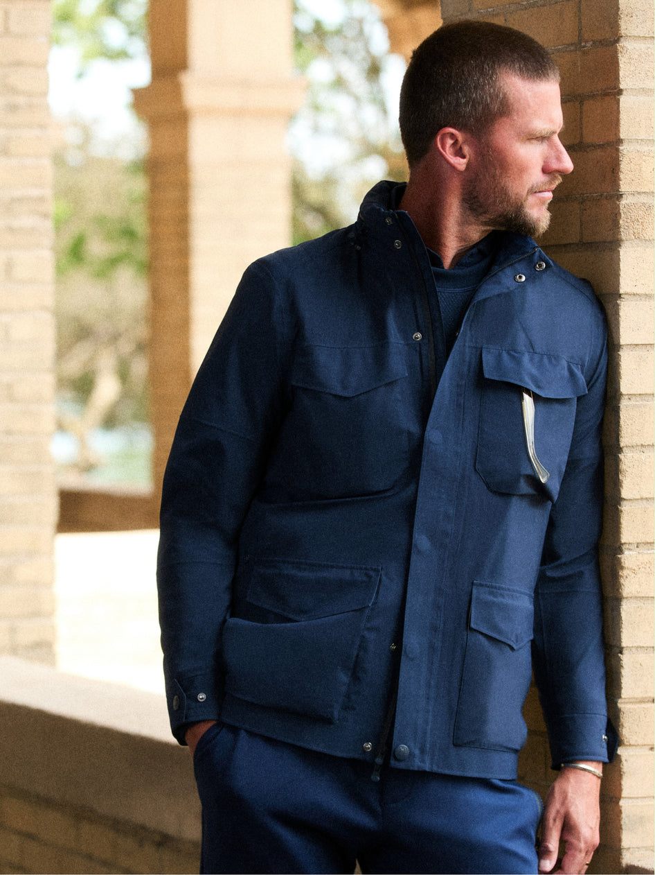 Navy Men's Premium Golf Jacket Layered Look - On Model Side Profile | Greyson Clothiers