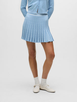 Maltese Blue Pointelle Skirt - Side View, Pleated Technical Knit On Model | Greyson Clothiers