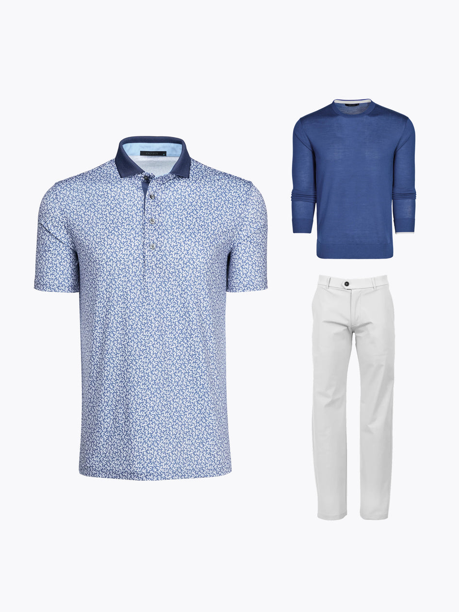 Joaquin Niemann PGA Scripting Bundle - Floral Polo, Blue Crewneck & Arctic Trouser Flat Lay | Greyson Clothiers
