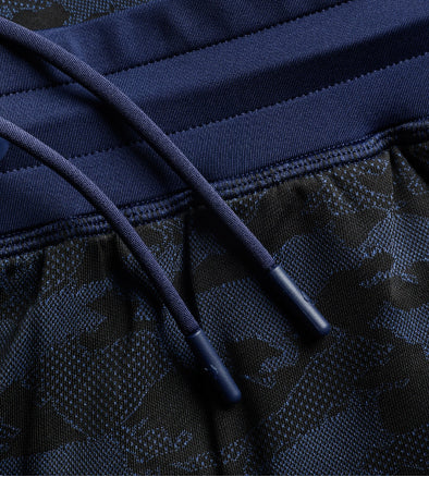 Navy blue shorts with camouflage pattern and drawstring